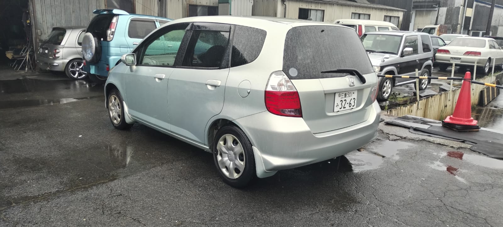 пружина Honda Fit