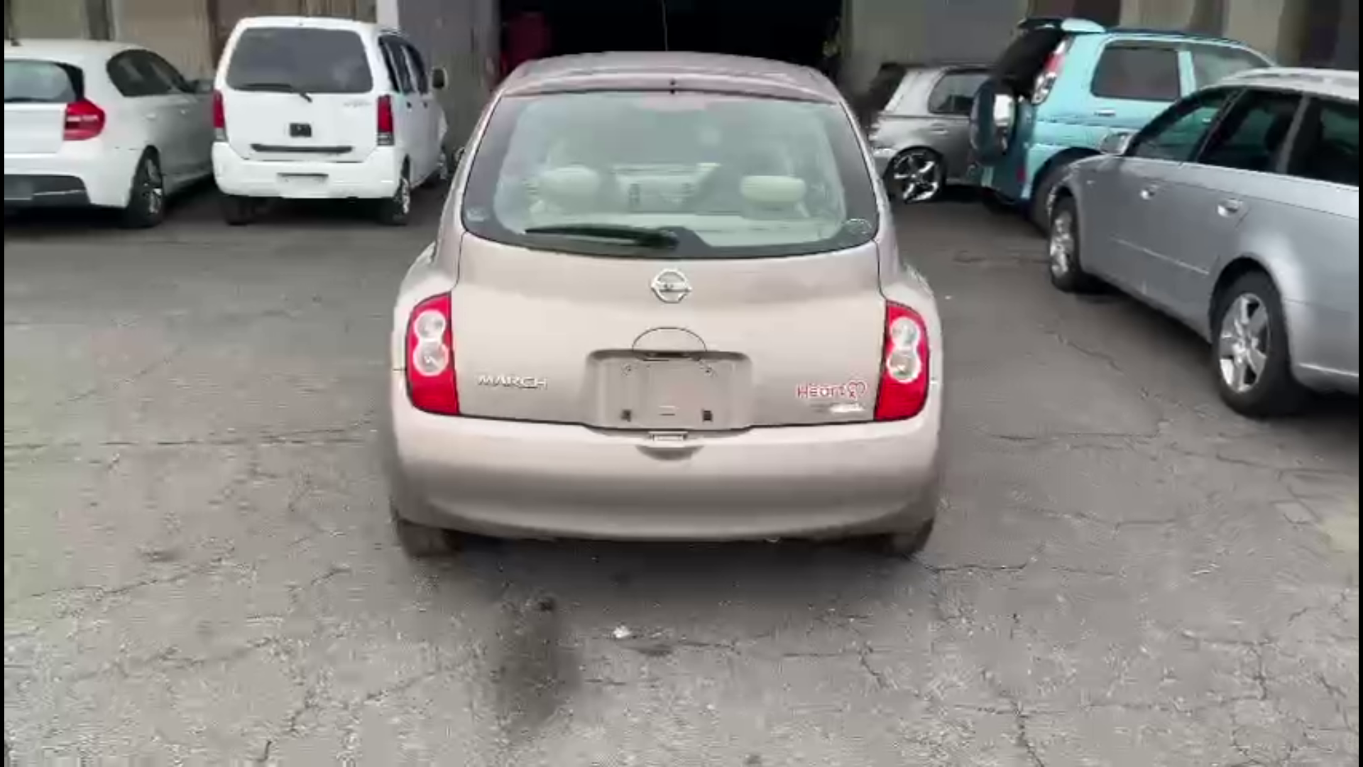 стойка Nissan March