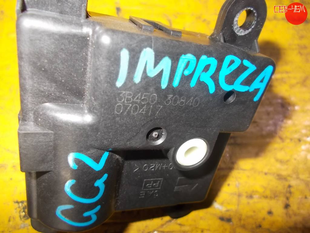 моторчик привода заслонок печки Subaru Impreza
