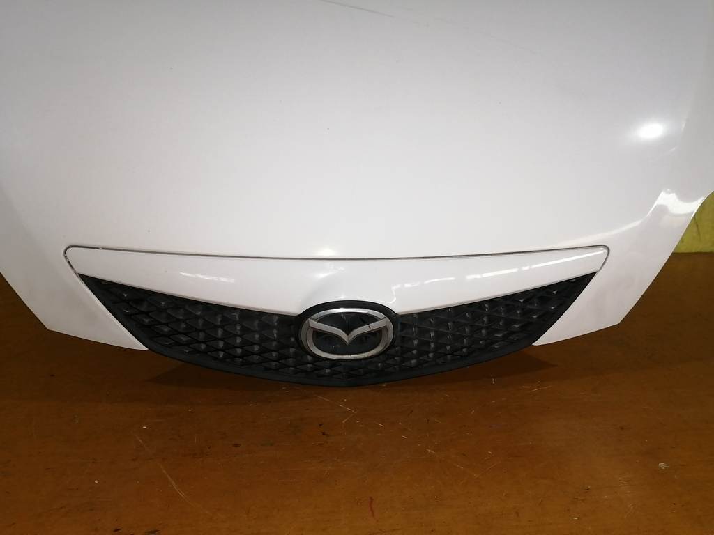 капот Mazda Demio