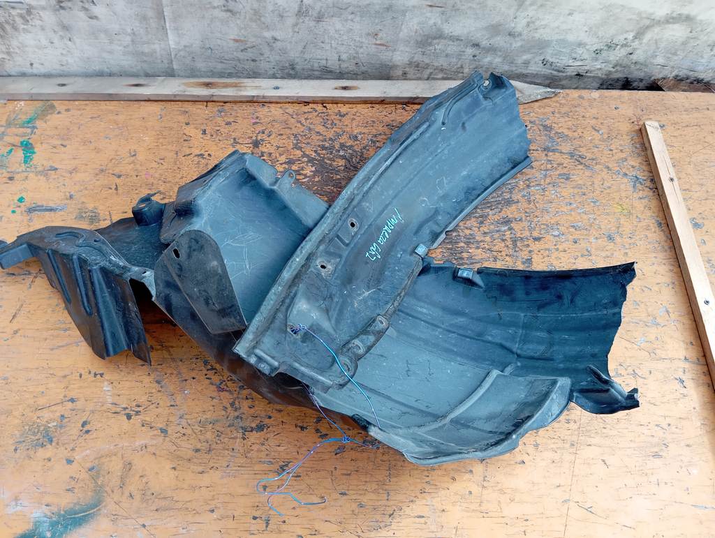 подкрылок Subaru Impreza