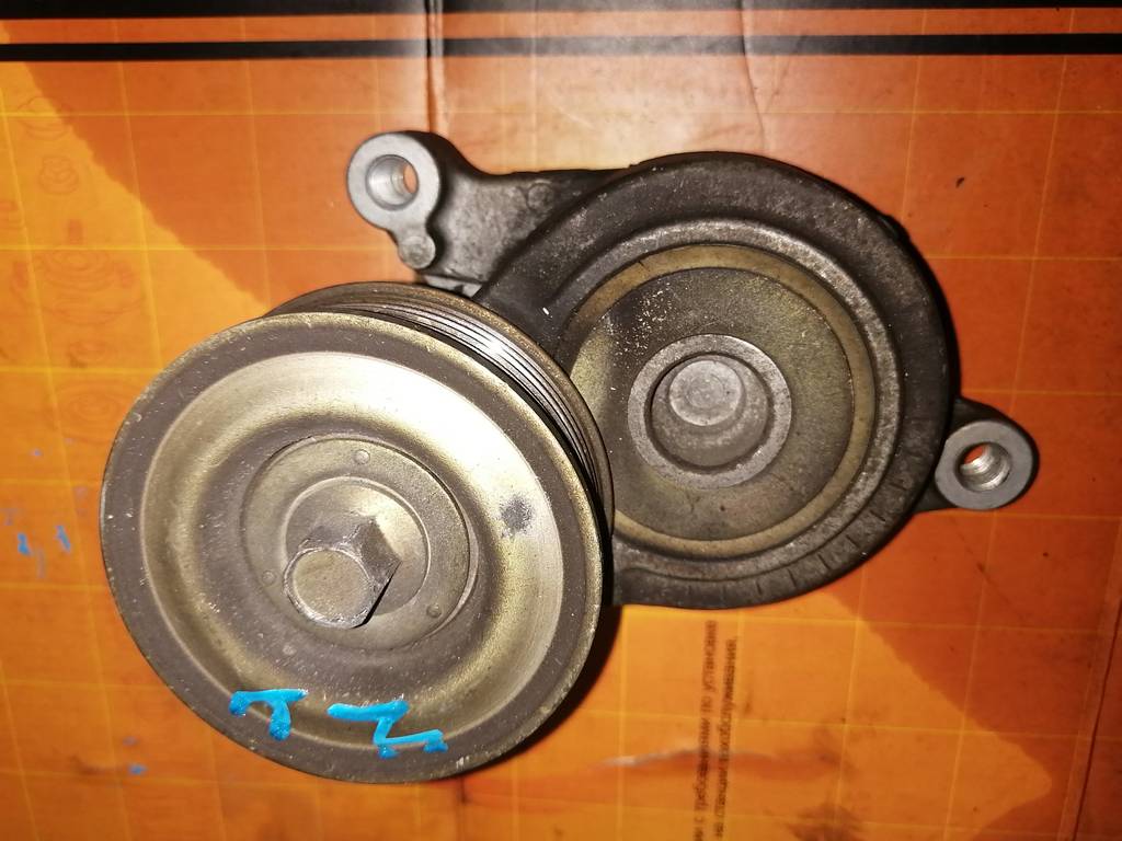 натяжитель Mazda