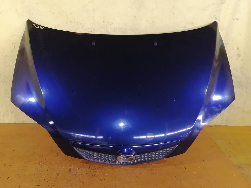 капот Mazda Demio