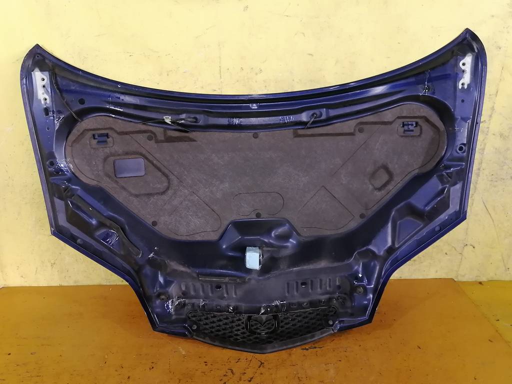 капот Mazda Demio