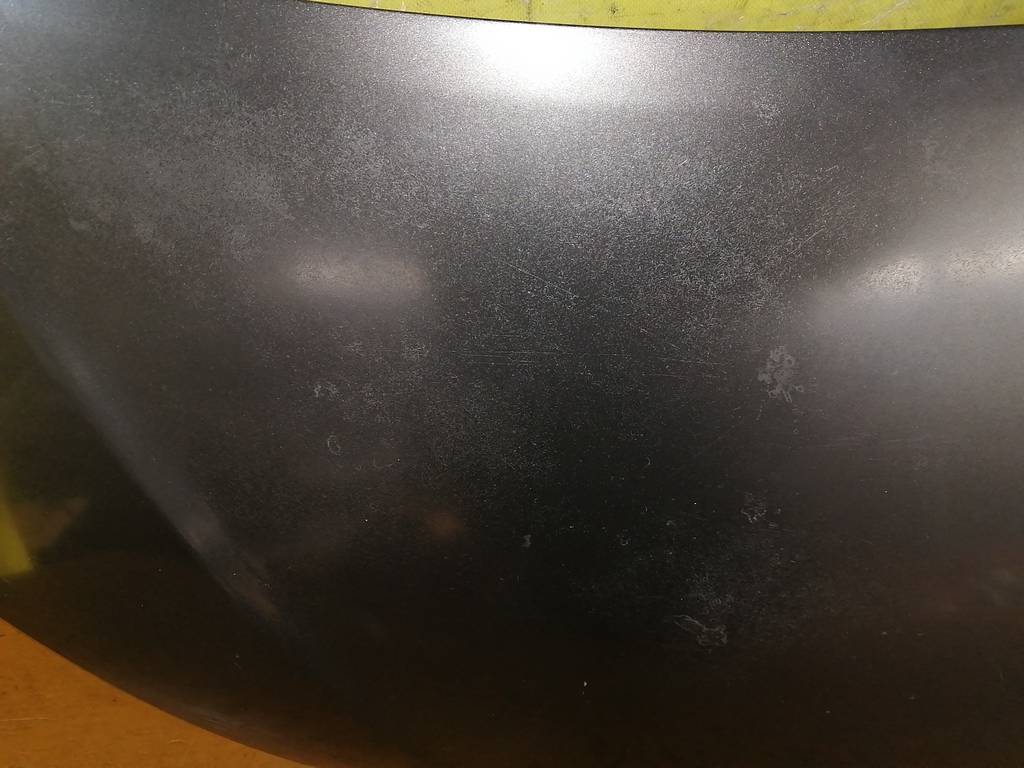 капот Toyota Vitz