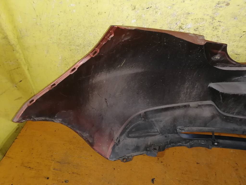 бампер Mazda Demio