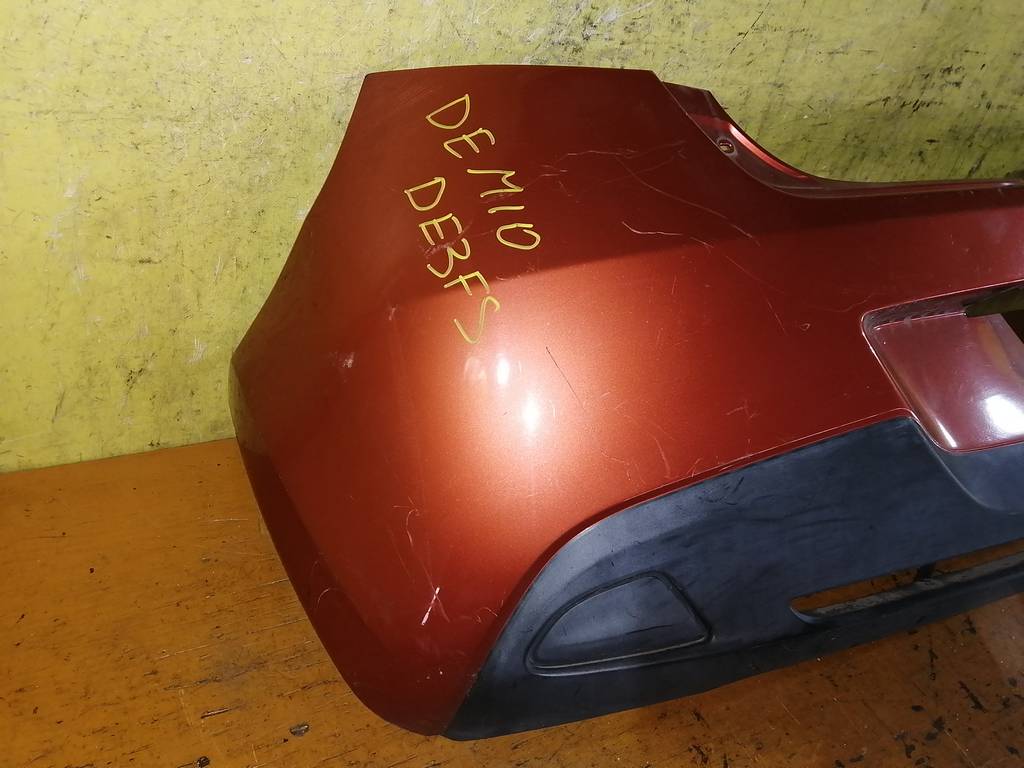 бампер Mazda Demio