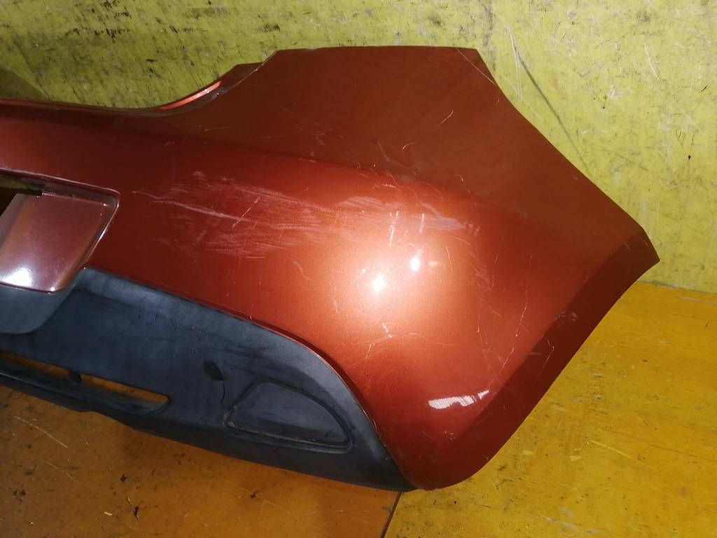 бампер Mazda Demio