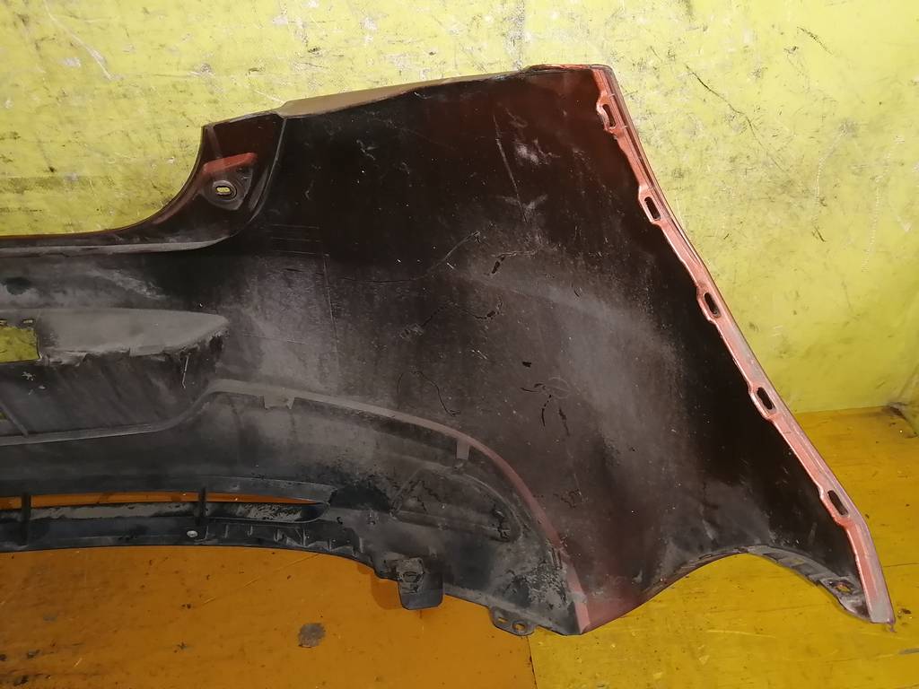 бампер Mazda Demio