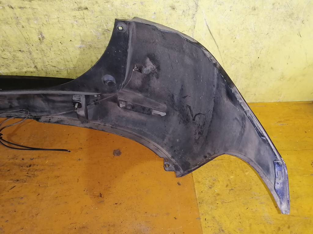 бампер Mazda Demio