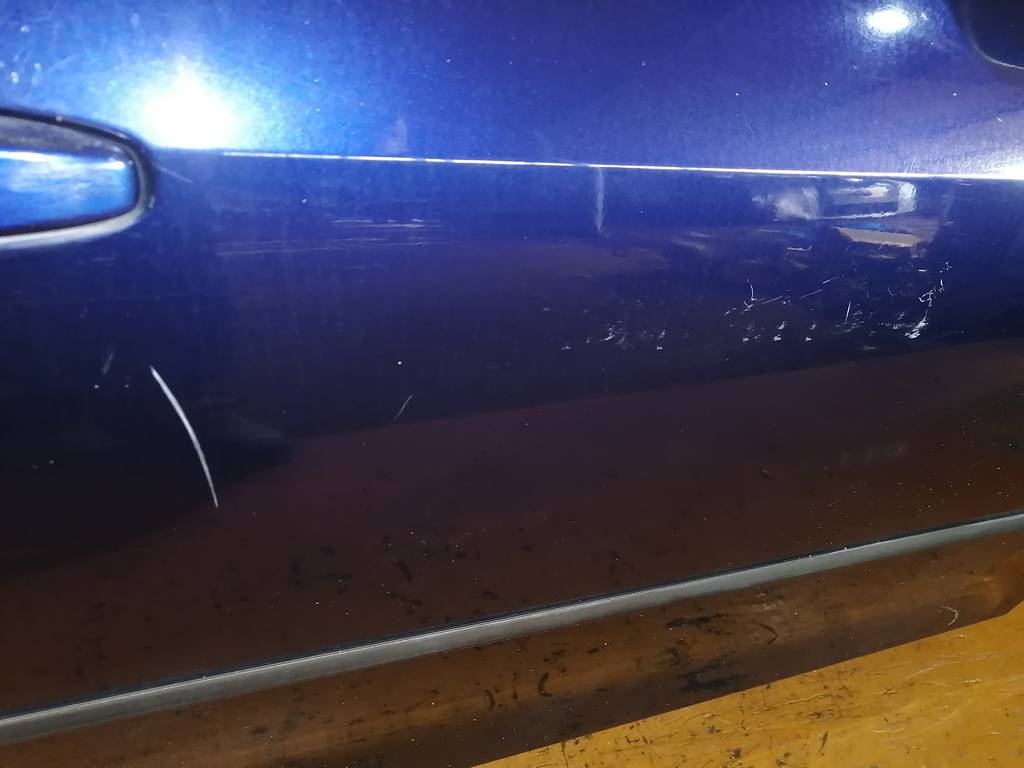дверь Mazda Demio