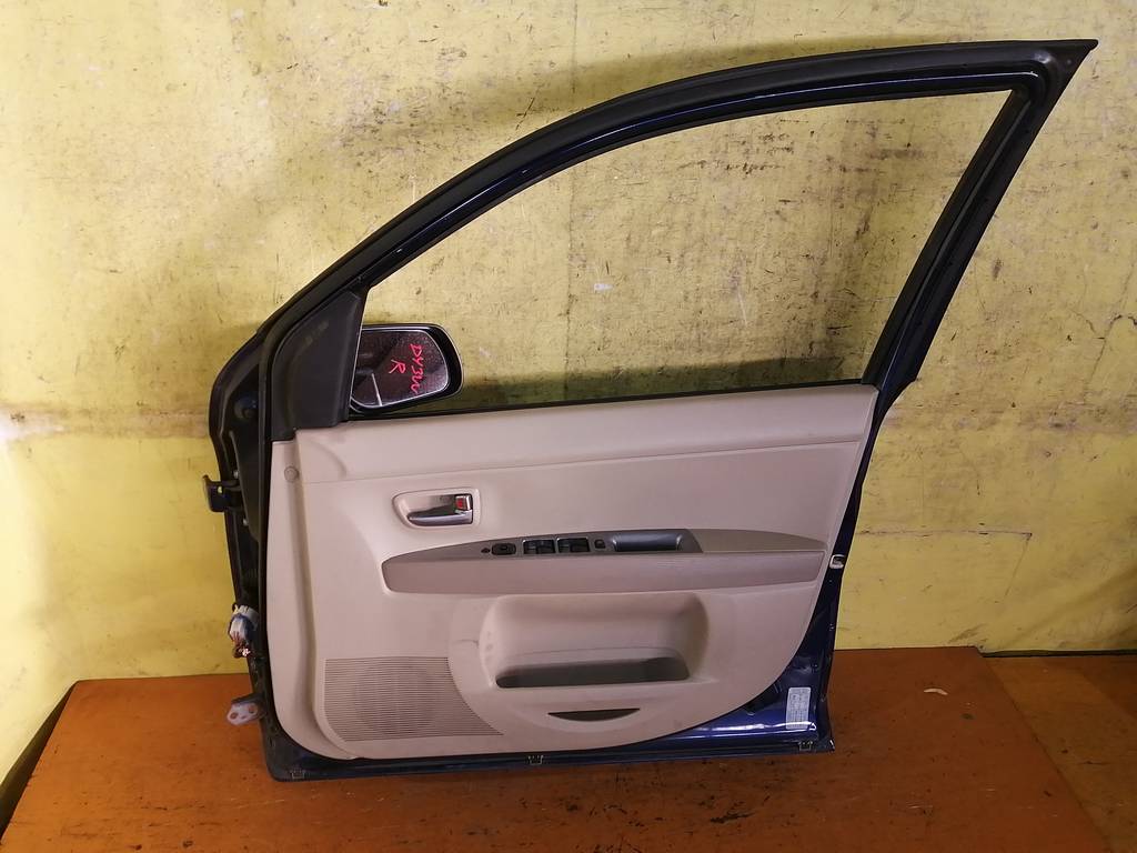 дверь Mazda Demio