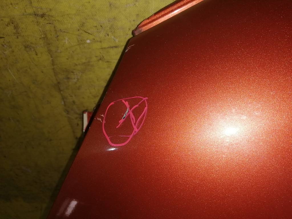 крыло Mazda Demio