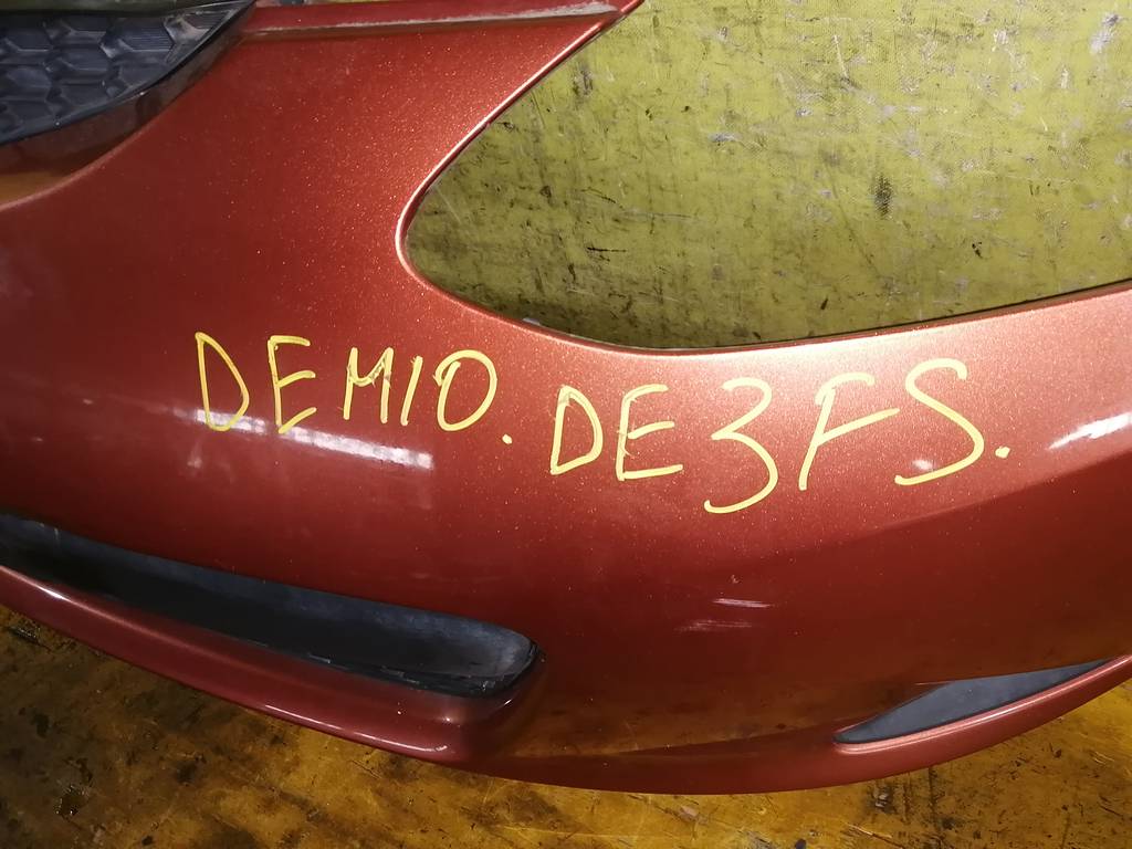 бампер Mazda Demio