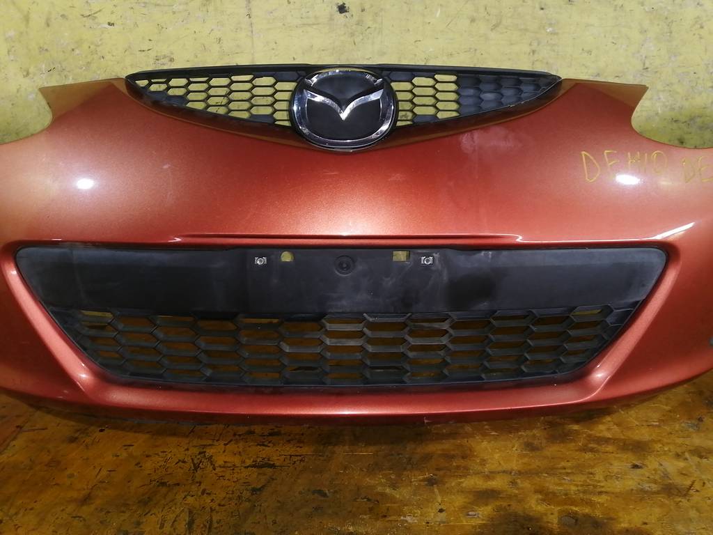 бампер Mazda Demio