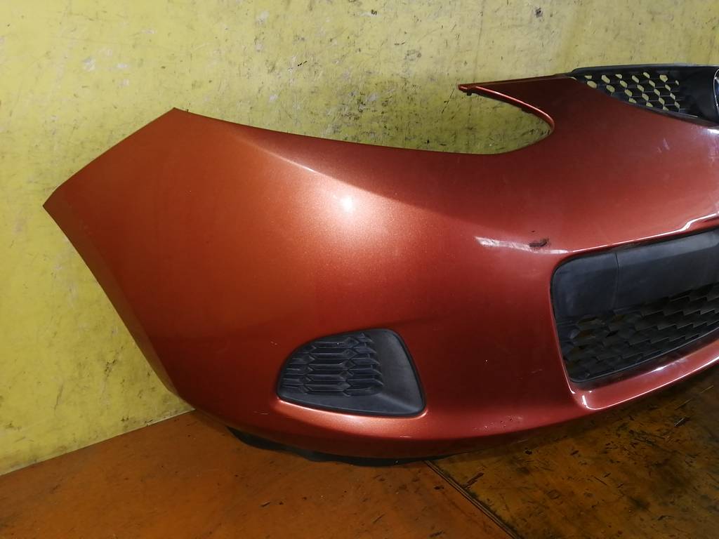 бампер Mazda Demio