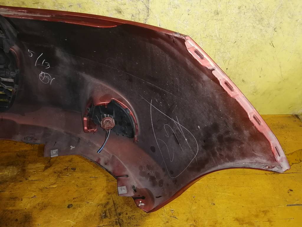 бампер Mazda Demio