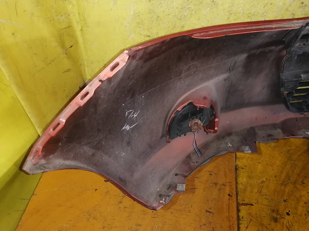 бампер Mazda Demio