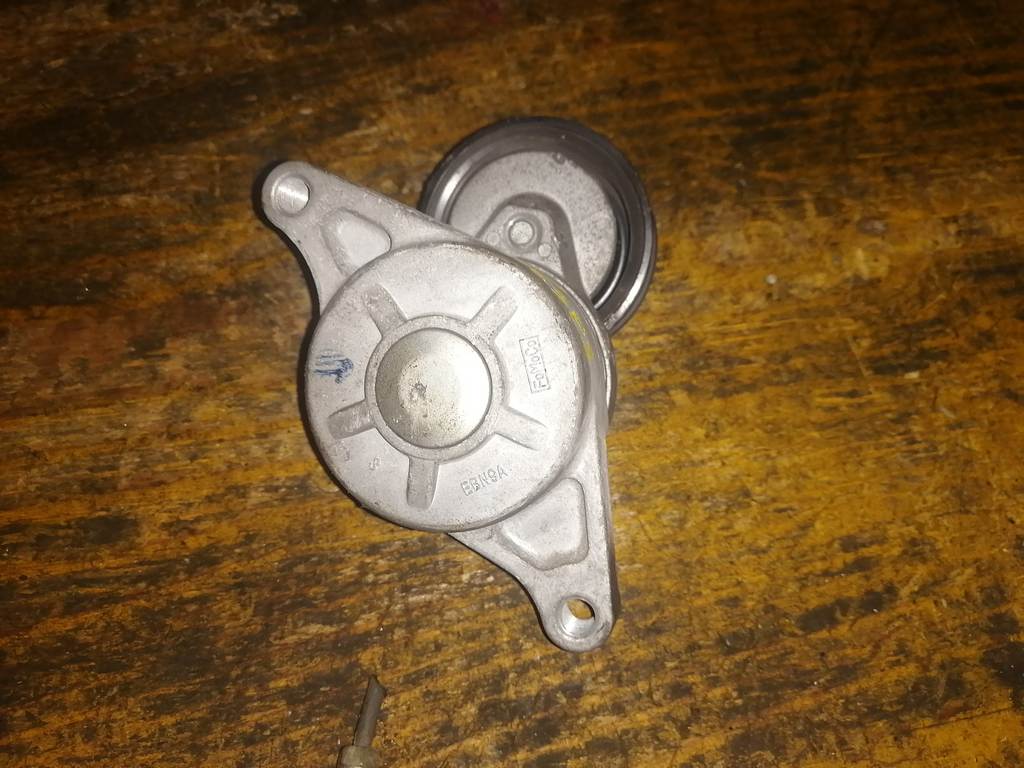 натяжитель Mazda Demio