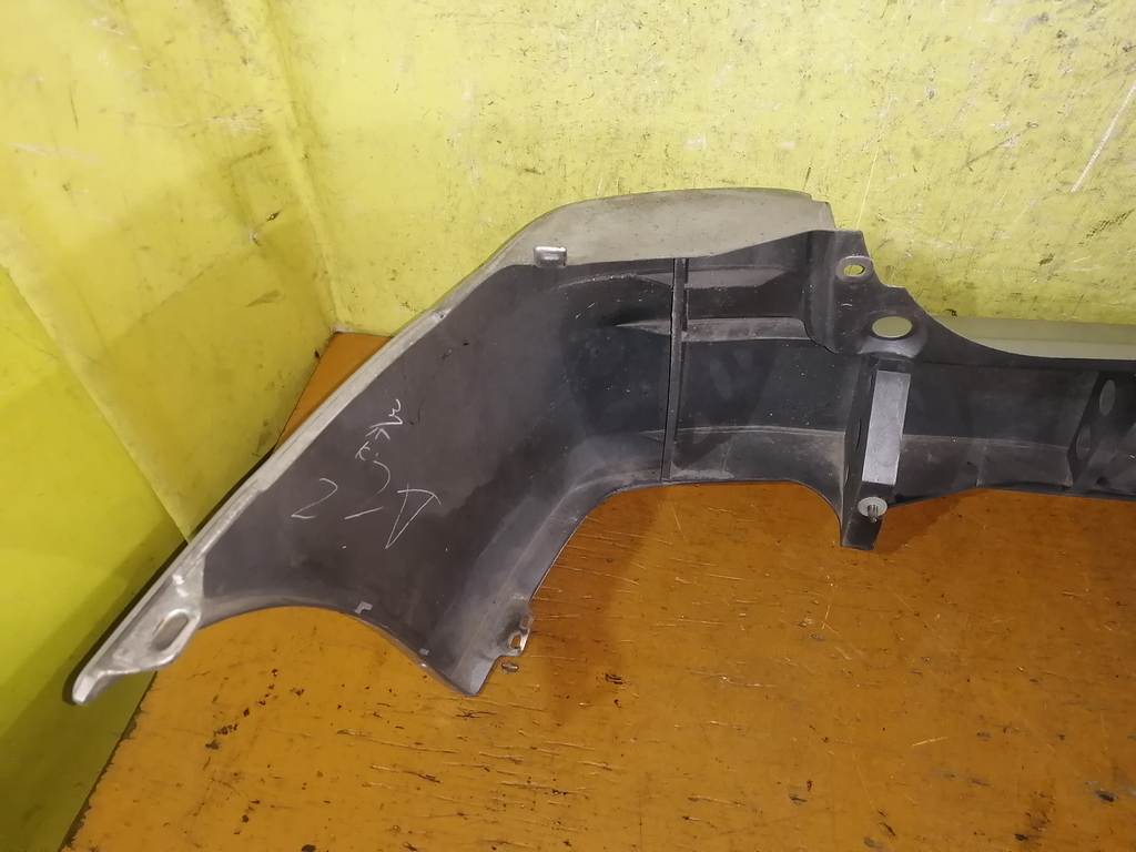 бампер Mazda Demio