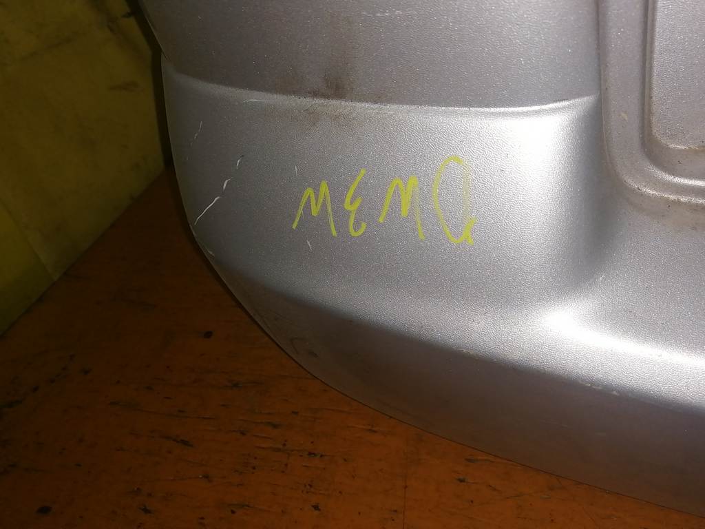 бампер Mazda Demio