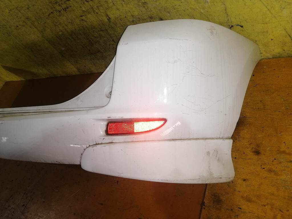 бампер Mazda Demio