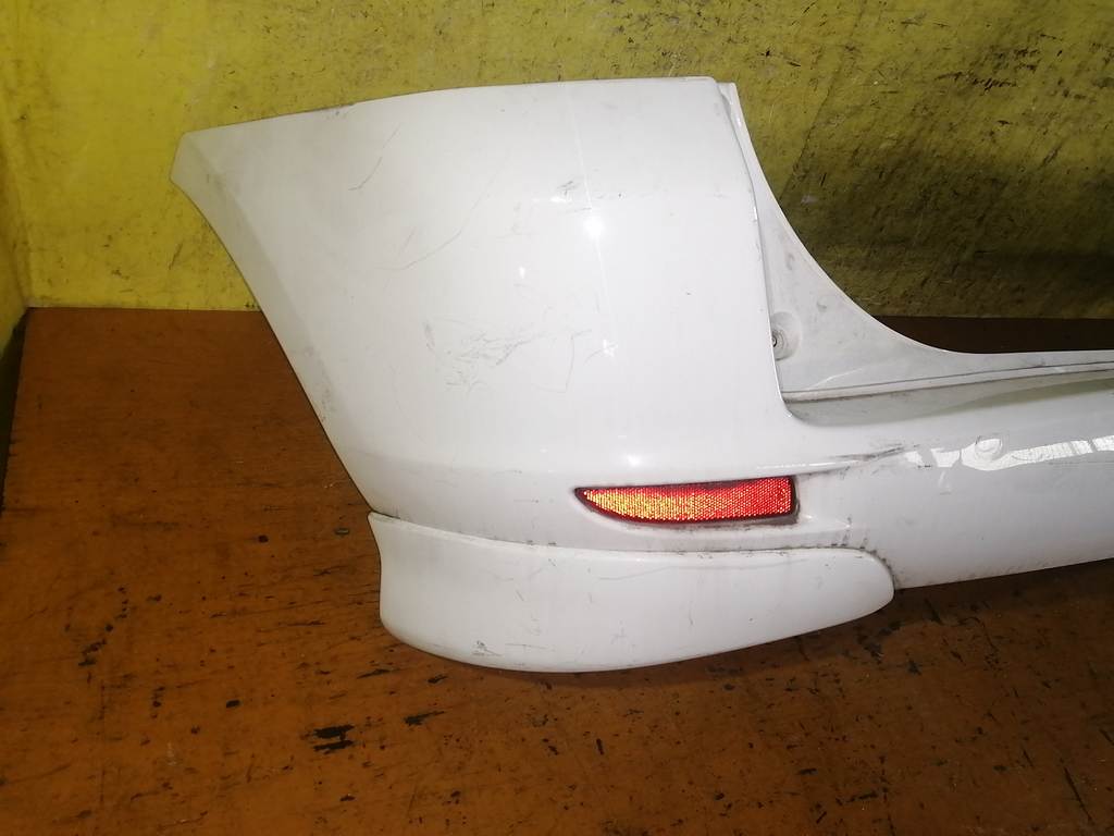 бампер Mazda Demio