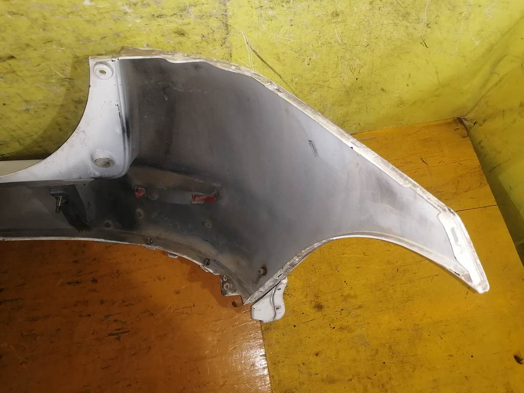 бампер Mazda Demio