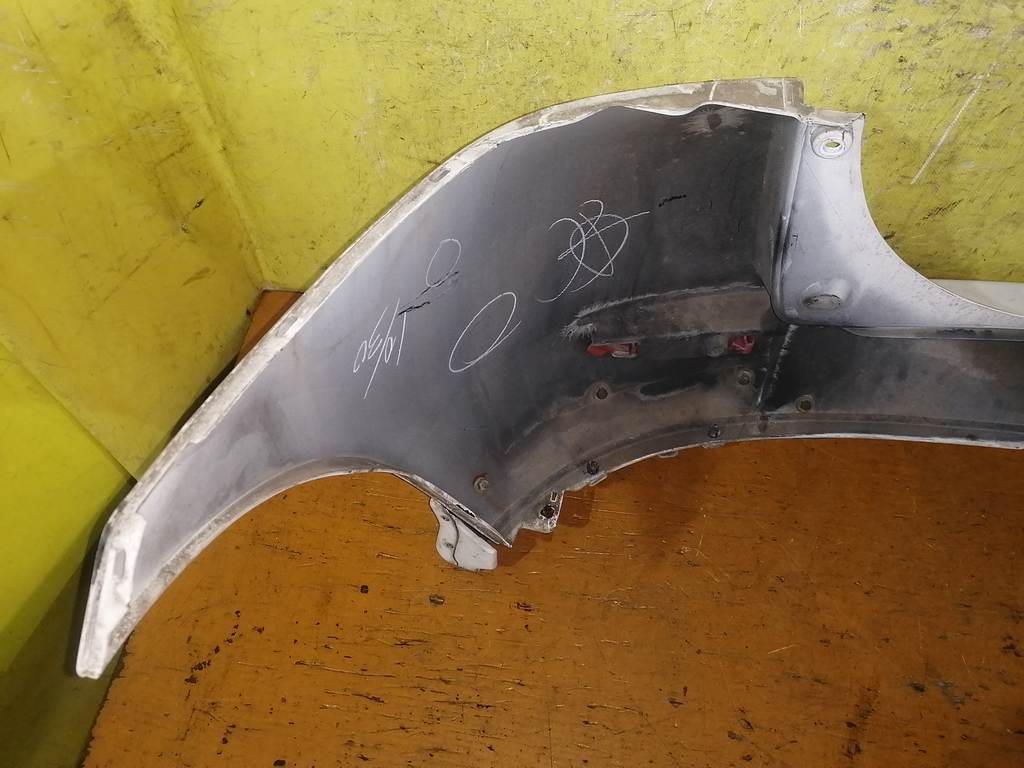 бампер Mazda Demio
