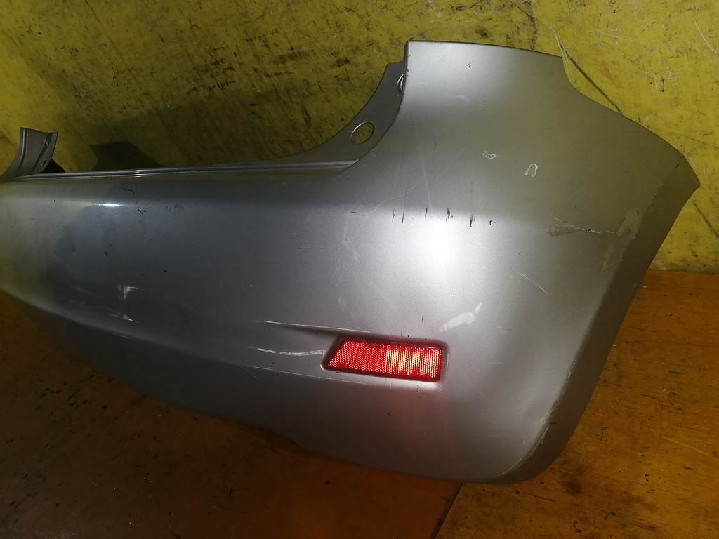 бампер Nissan Note