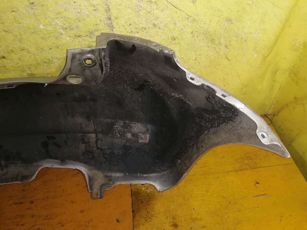 бампер Nissan Note