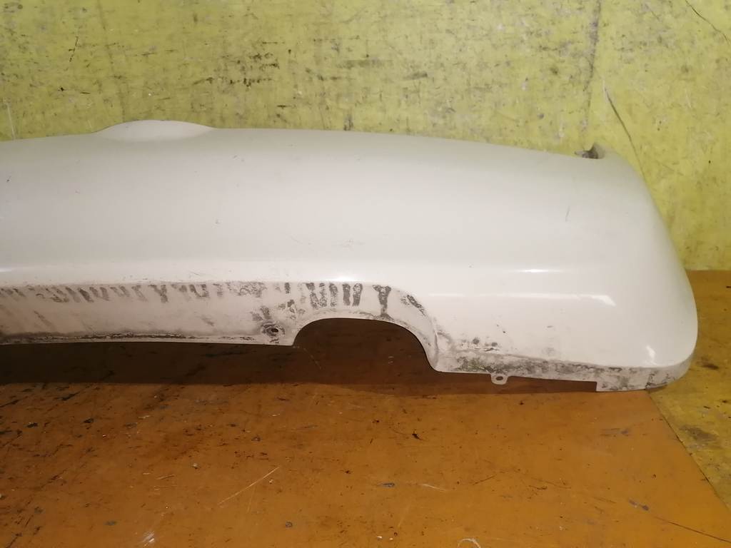 бампер Nissan March