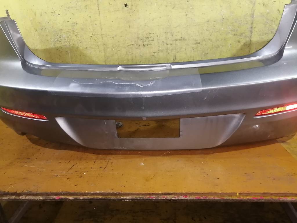 бампер Mazda Axela