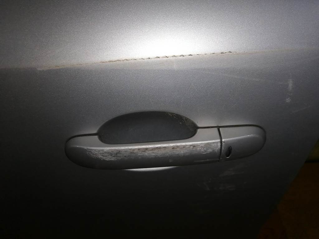 дверь Nissan Note