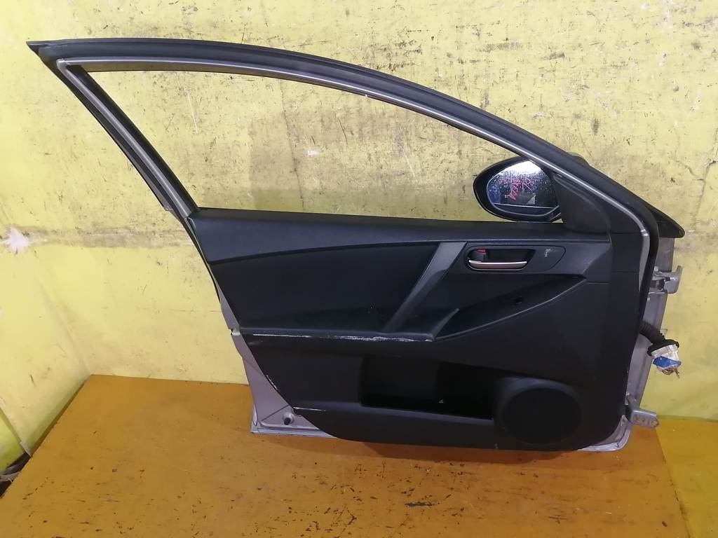дверь Mazda Axela