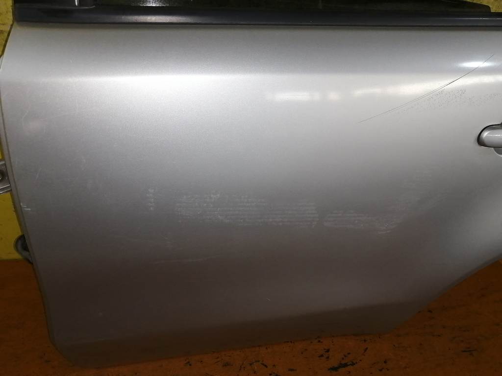 дверь Nissan Note
