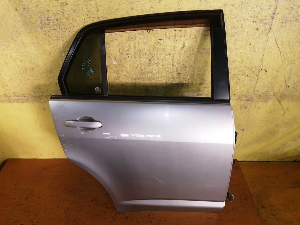 дверь Nissan Tiida Latio