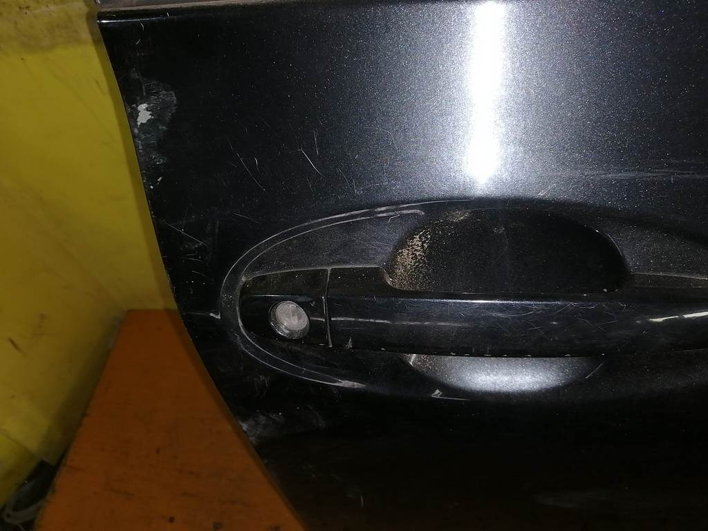 дверь Toyota Vitz