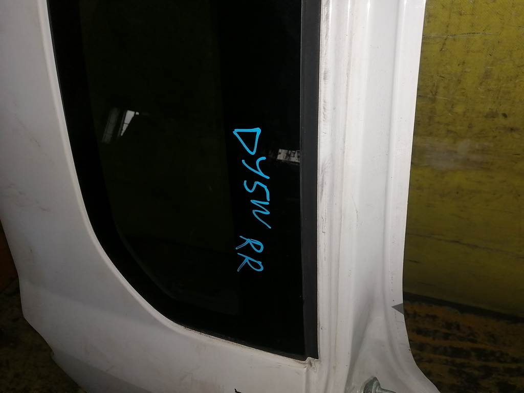 крыло Mazda Demio