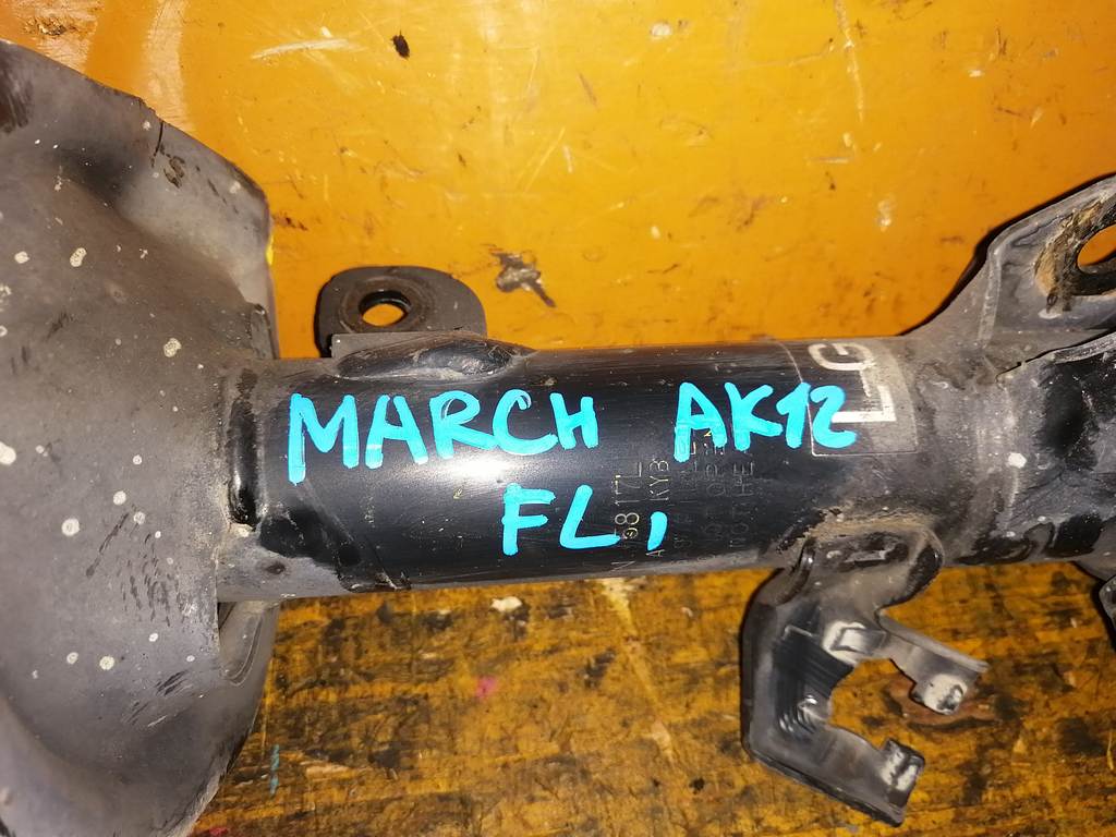 стойка Nissan March