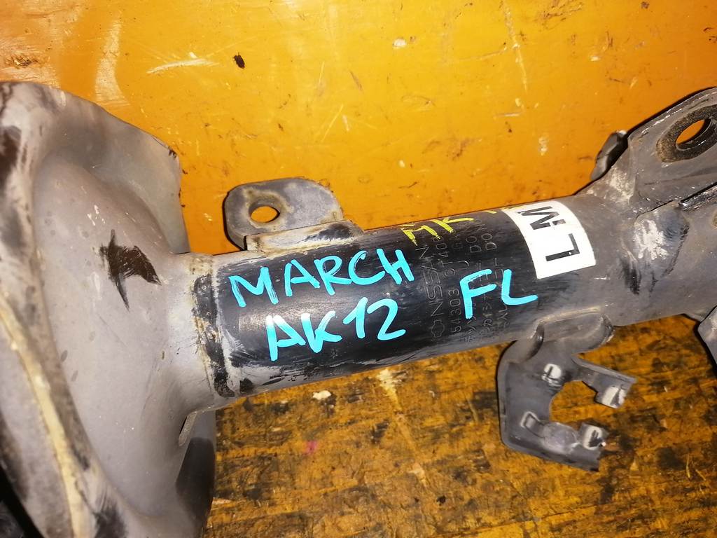стойка Nissan March