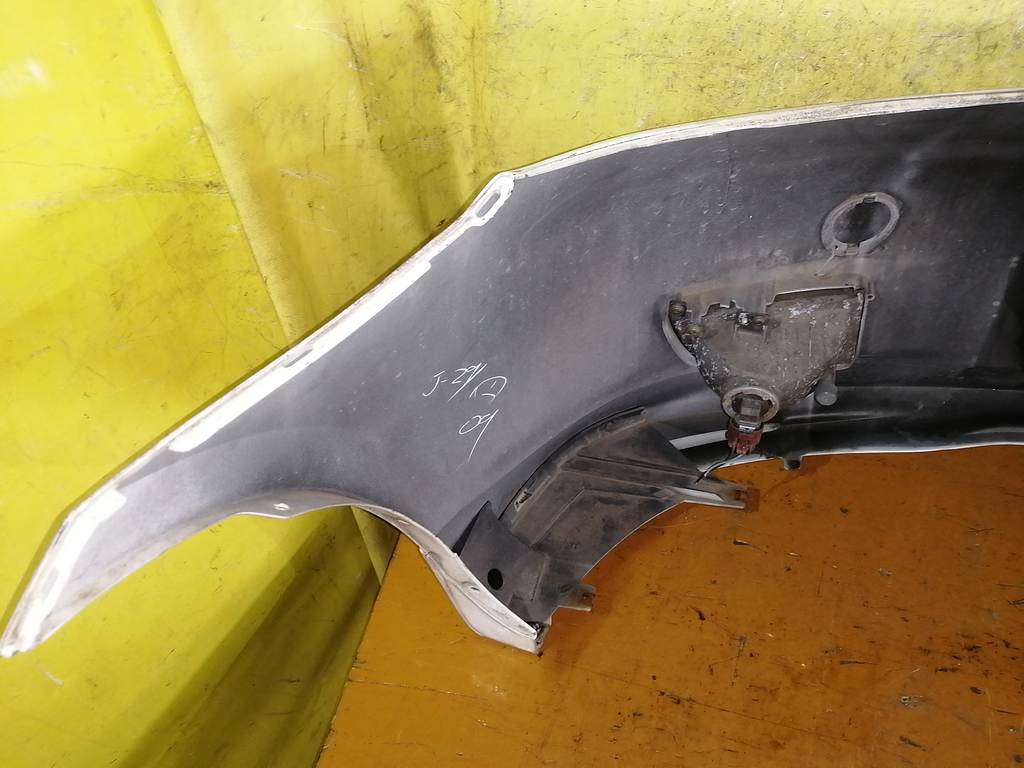 бампер Mazda Demio