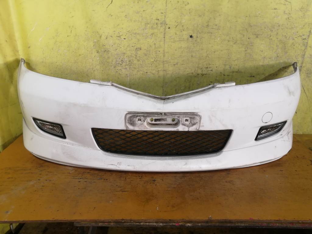 бампер Mazda Demio