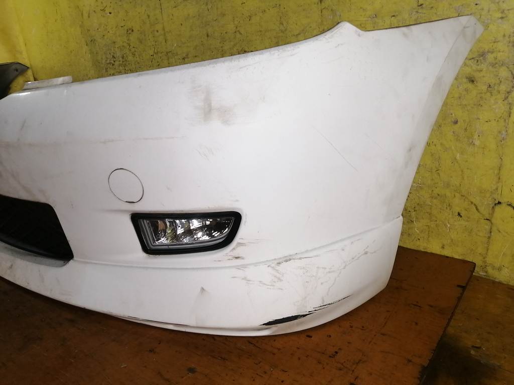 бампер Mazda Demio