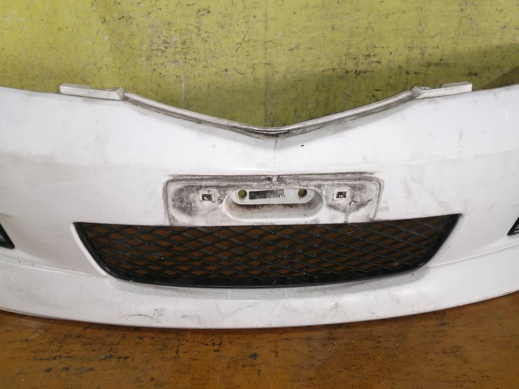 бампер Mazda Demio