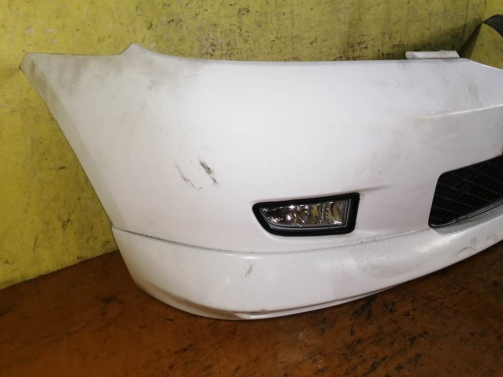 бампер Mazda Demio