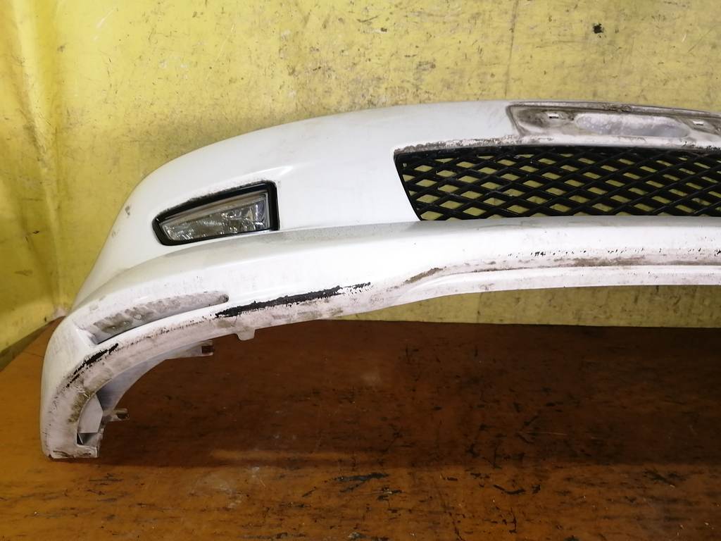 бампер Mazda Demio