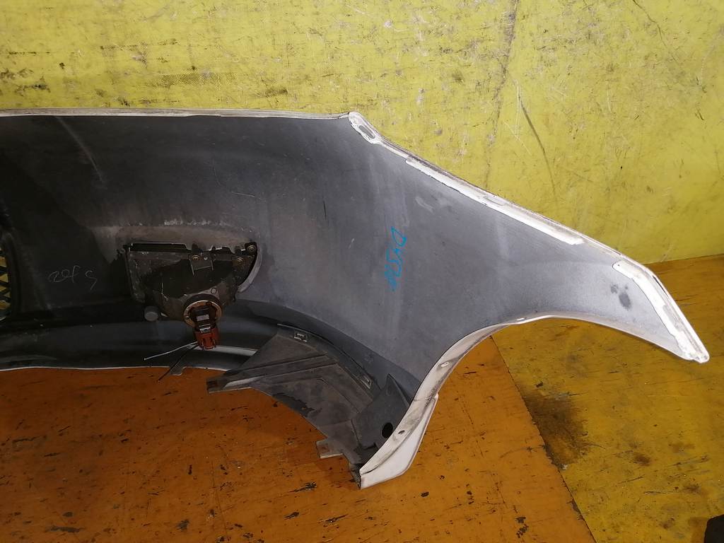 бампер Mazda Demio