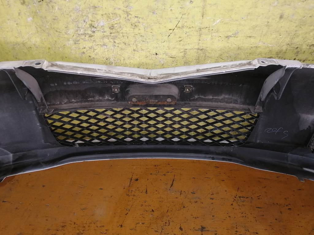бампер Mazda Demio