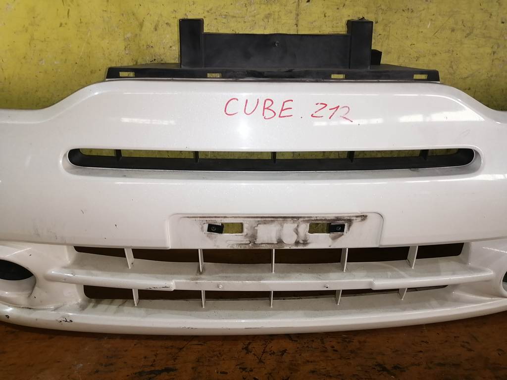 бампер Nissan Cube